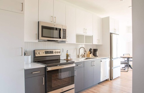 Yankee Hill Apartment | Modern East Side 1BR Apt with Balcony, Pool, and Gym
