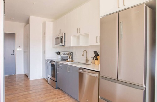 East Town Apartment | Modern East Side 1BR Apt with Balcony, Pool, and Gym