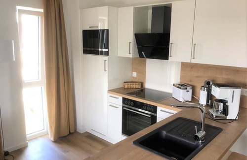 Schillig Apartment | Modern, high-quality vacation apartment, sauna, large balcony, close to the beach
