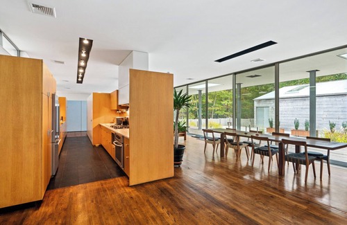 Springs House | Modern home sited on a lush wood acre, stunning pool, covered deck, outdoor.