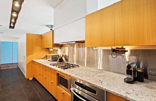 Springs House | Modern home sited on a lush wood acre, stunning pool, covered deck, outdoor.