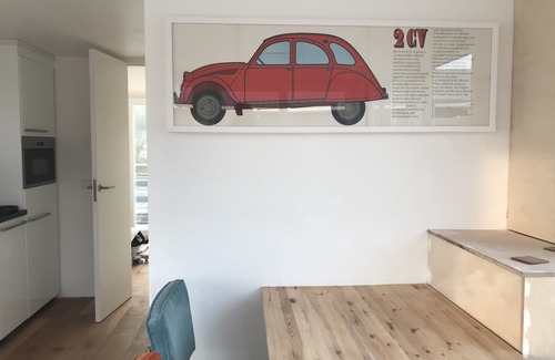 Stavoren Boat Rental | Modern houseboat in quiet harbor close to the IJsselmeer with SUPs and canoe