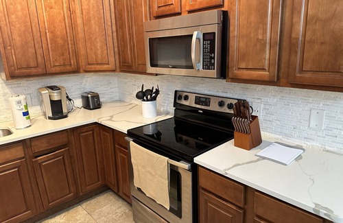 Mobile House | Modern lower level midtown apartment with cable and high speed internet!