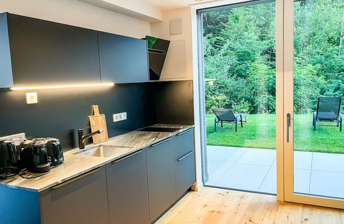 Sant'Andrea in Monte Apartment | modern, luxury, private entrance, garden, terrace, and stunning mountain views.