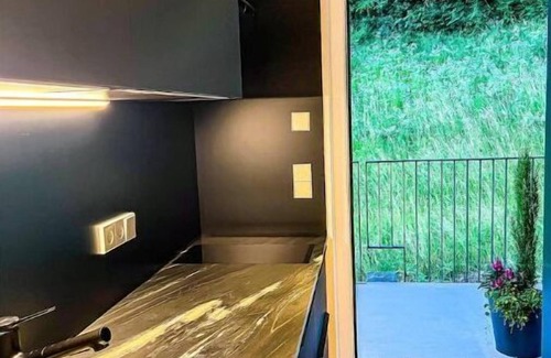 Sant'Andrea in Monte Apartment | modern, luxury, private entrance, garden, terrace, and stunning mountain views.