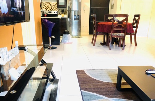 Saint Andrew Apartment | MODERN LUXURY SUITES 2 BR/2BA/COZY/GATED/INFINITY POOL/24/7 SECURITY
