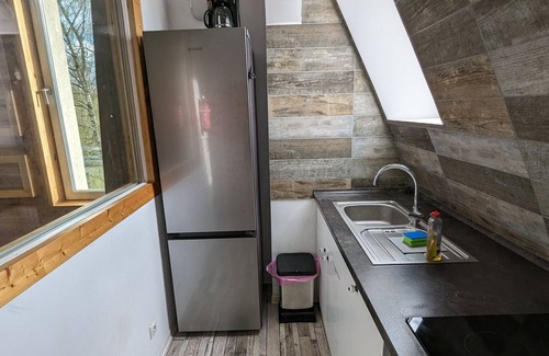 Marienfelde Apartment | Modern meets wood