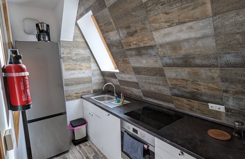 Marienfelde Apartment | Modern meets wood