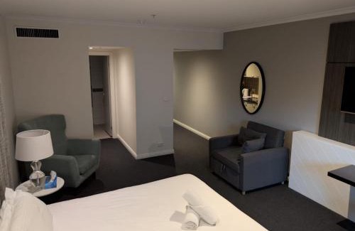 Chinatown Apartment | Modern Nomads Beautiful King Studio with Indoor Pool & Balcony