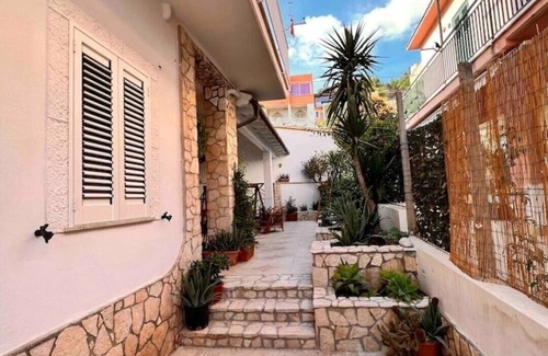 Marina di Palma Apartment | Modern oasis. 1 minute walk to the beach. A/C