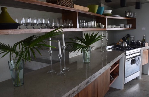 Micoud Villa | Modern Oceanfront Home with Pool, Outdoor Showers and Private Tennis Court