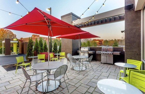 Newtonville Hotel | Modern Retreat: Pets Allowed, Onsite Pool. Close to Six Mile Waterworks!