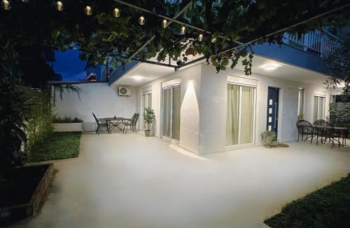 Olymbiaki Akti House | Modern Seaside Retreat with Private Patio and Parking - Blue Zone Homes