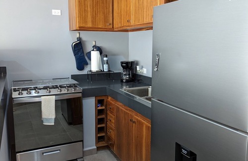 Libertad Condo | Modern, spacious condo w/pool. Close to Downtown.