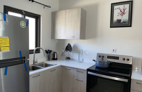 Discovery Bay House | Modern Townhouse with beach/pool access which offers peace, quiet and relaxation