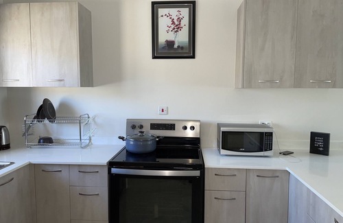 Discovery Bay House | Modern Townhouse with beach/pool access which offers peace, quiet and relaxation