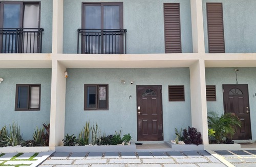 Discovery Bay House | Modern Townhouse with beach/pool access which offers peace, quiet and relaxation
