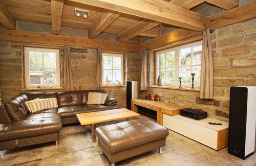Wiek Apartment | moderne Ferienwohnung mit Kamin, Sauna, Terrasse - Ferienhaus Stenhuus FeWo 01