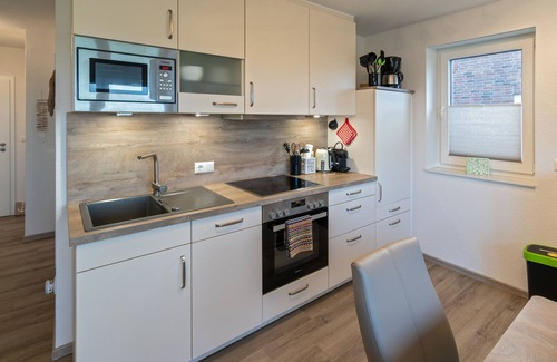 Neßmersiel Apartment | Moderne Oberwohnung mit Balkon