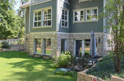 Schwielowsee Apartment | Moderne Wohnung im skandinavischen Stil am Waldrand