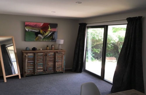 Purakaunui House | Modernised Bach at the beautiful and secluded Long Beach.
