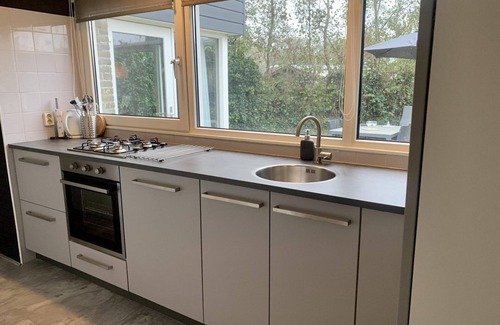 Sint Maartensvlotbrug House | Modernly furnished, ground-level 2-bedroom bungalow, close to forest, beach and sea. Free WiFi, washing machine and dryer