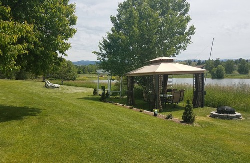 Florence House | Montana Mountain Memories- RV in Orchard by Trout Pond