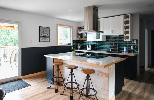 Murdochville House | Murdoch Beach House - Fireplace and Sauna