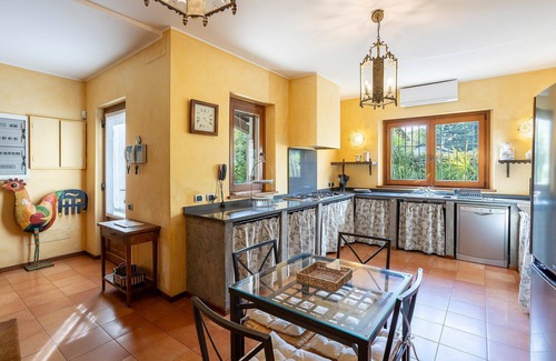 Solcio Villa | My Rental Homes - Villa Brin with tennis court, private sandy beach and dock