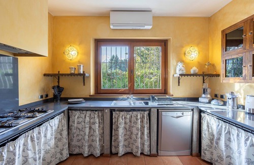 Solcio Villa | My Rental Homes - Villa Brin with tennis court, private sandy beach and dock