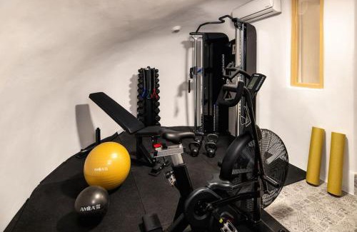 Messaria Villa | Mystagoge Retreat cave with an indoor pool and gym