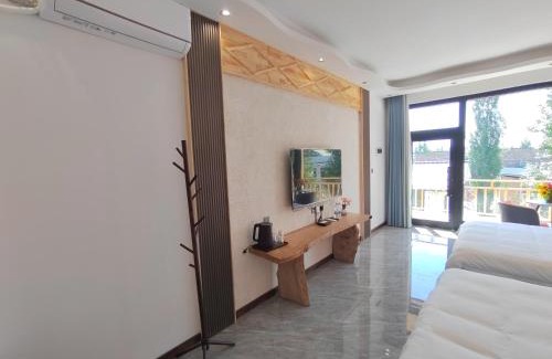 Xinyuan House | Nalati Funri Hotel