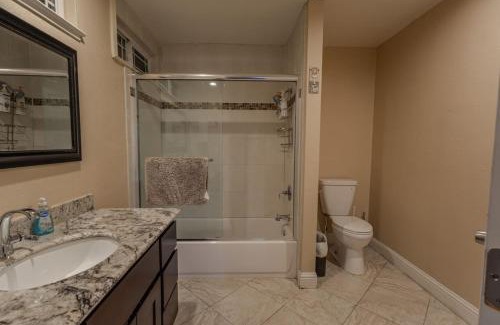 South San Jose House | Narvaez Master bedroom private entry and bathroom