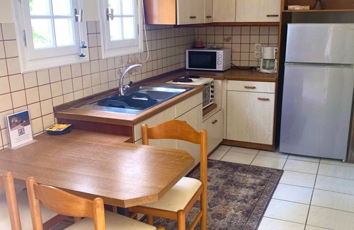 Agios Gordios Apartment | Natalia Apartment A with panoramic sea views of Agios Gordios bay