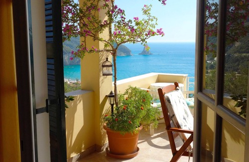 Agios Gordios Apartment | Natalia Apartment A with panoramic sea views of Agios Gordios bay
