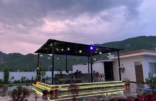 Alwar Other | Nestled amidst majestic mountains, our farmhouse offers a serene and picturesque