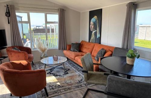 Westerland House | Neues Ferienhaus Chalet Nr73 zweite Reihe direkt am Wattenmeer, komplett eingezäunt