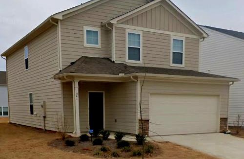 McDonough House | New 3 Bedroom Home with many amenities & parking
