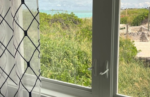 Treasure Cay Villa | NEW - BEACH FRONT RAISED VILLA-VIEWS FROM EVERY ROOM & WHOLE HOUSE GENERATOR!