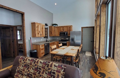 Phillips Cabin | New cabin with lake-facing windows on 400-acre Long Lake of the Phillips Chain.