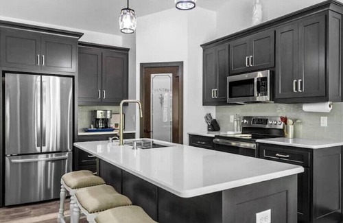 Jacksonport House | New, charming custom home, 7 minute walk to the beach
