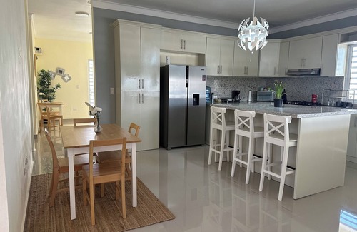 Barahona House | New construction luxury home with Bay views of the Southwest Beaches