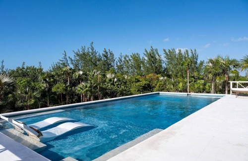 Governor's Harbour House | New Home w/Heated Pool on Prestigious Banks Rd