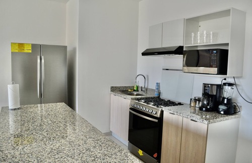San Salvador Condo | New Luxury 3 Bedroom Condo W/Terrace