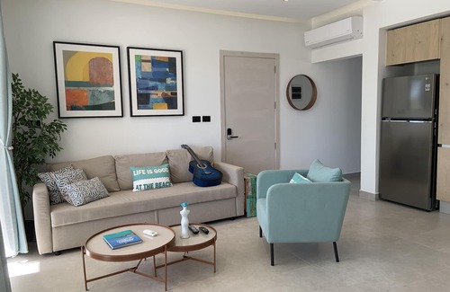 Bouvet Island Condo | New Luxury Condo: Private Beach Club with Breathtaking Ocean View in Dominicus