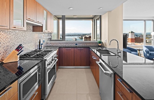 Inner Harbour Condo | New! Ocean and Mountain View King Suite