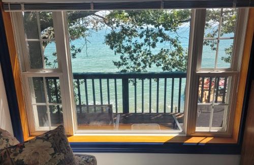 Northeastern Michigan Apartment | New! Schmidt's Cove - Amazing Private Lakefront!