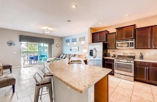 Loughman Villa | NEW! Spacious 5-Bedroom Resort Pool Home with Lake View
