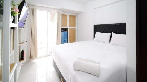 Sidoarjo Apartment | New Studio Apartment with Strategic Location at Suncity Residence By Travelio
