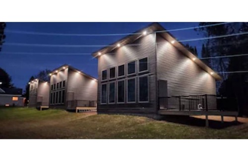 Phillips Cabin | New waterfront cabin with expansive lake-facing windows, Long Lake, Phillips